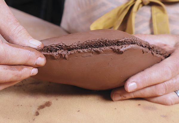 5 Score the rims of both slabs. Join the slabs and firmly press along the seam.