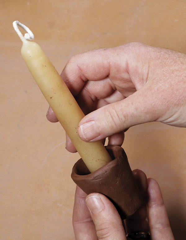 10 Make an open-ended candle cup pinch pot, using a candle as a guide for sizing.