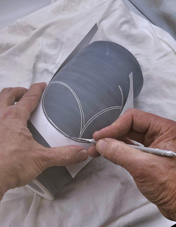 5 Apply a design using a cardstock template and a sharp needle tool.