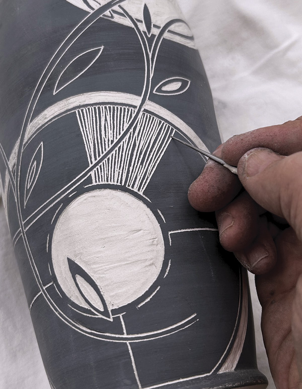 9 Use your needle tool to begin defining the sunburst.