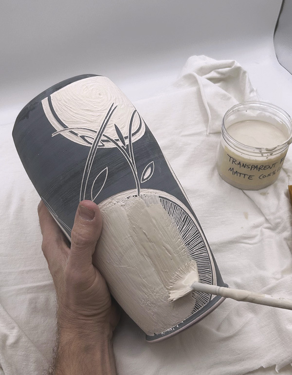 10 Brush transparent colored glaze onto focal points.