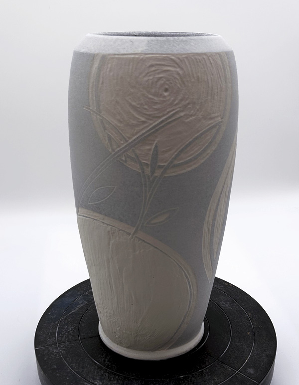 11 Bone-dry vase with clear glaze applied, before firing.