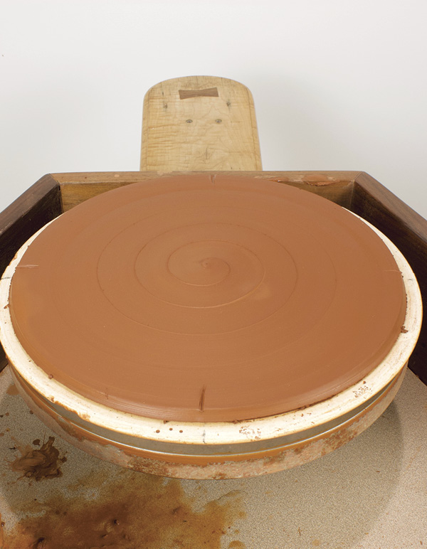 3 Throw slab for the bottom of the box slightly wider than the squared cylinder.