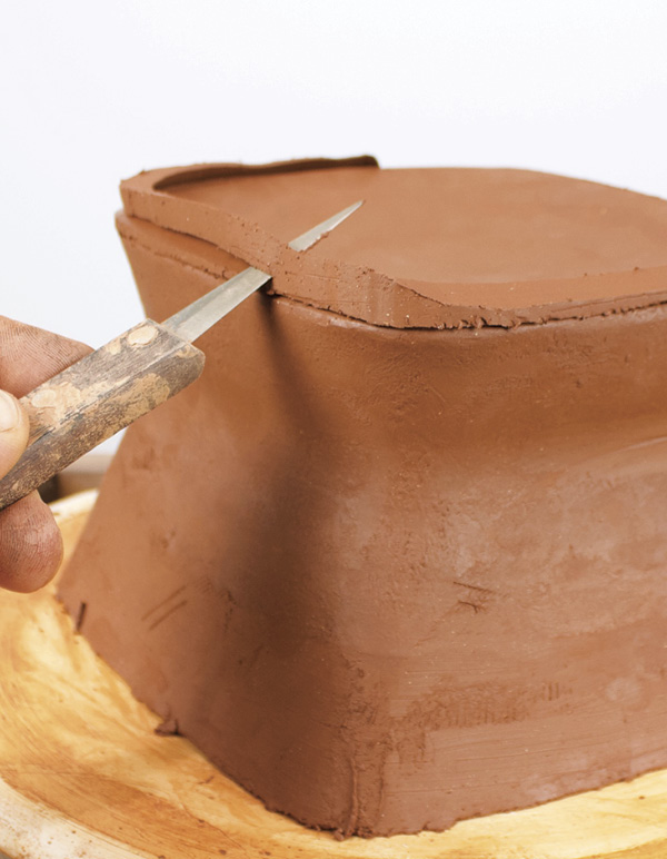 7 While slumped, cut excess material off the second slab and base at 45º angle.