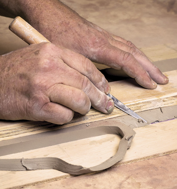 4 Use a template to cut out wall sections with a beveled top edge.