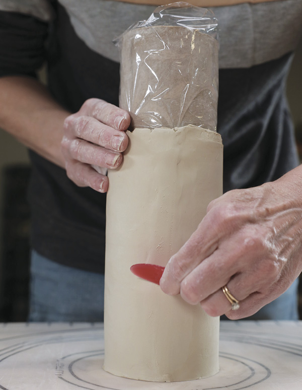 1 Wrap a tube with plastic, roll a clay slab, cut a straight edge, then cover the tube.