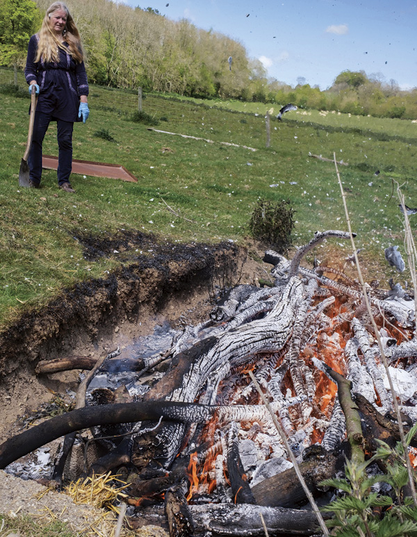 13 Once lit, the fire will burn for 3–4 hours before being covered with sheet metal.