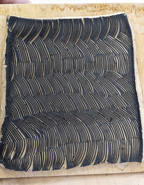 9 As you continue to throw and thin your slab, the marks made by your blade will continue to open up creating a high-contrast pattern.