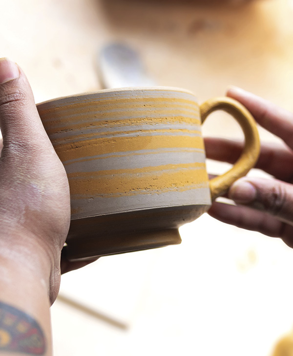 6 Attach handle using a thin slip. Try not to over blend the handle to the form.