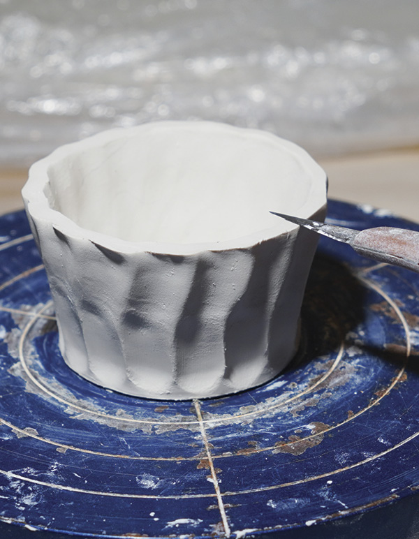 7 Allow to firm up, then level off the top with a sharp knife. Repeat steps 2–6.
