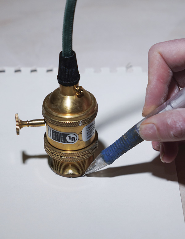 12 To calculate opening for your hardware, trace its circumference on paper.
