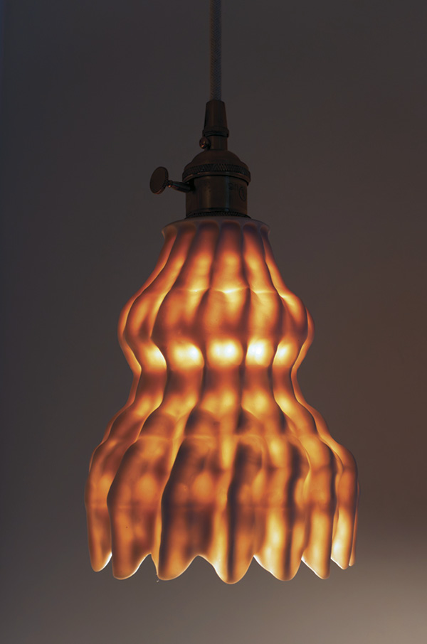 Grace Potter's Illumination II. Porcelain, hanging hardware, 2025.