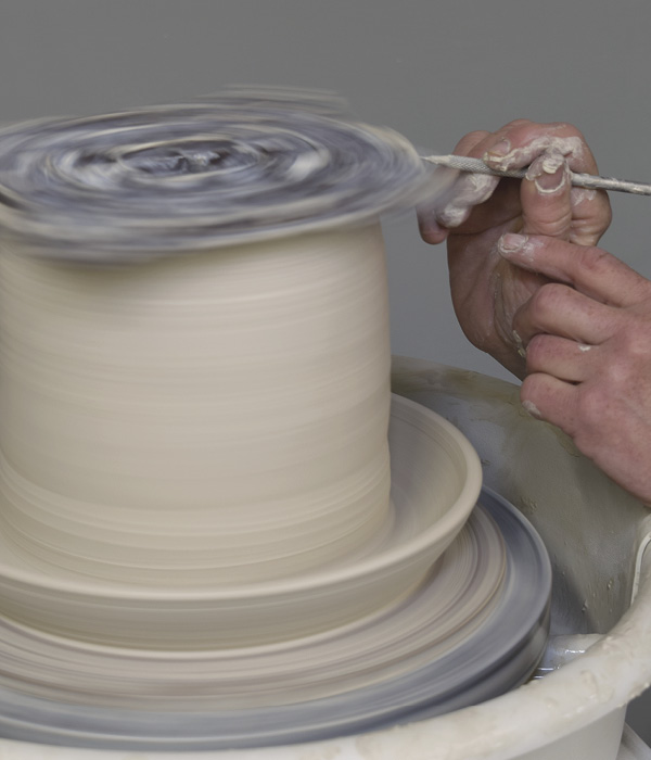 8 With the wheel turning, cut the bat off using a needle tool.