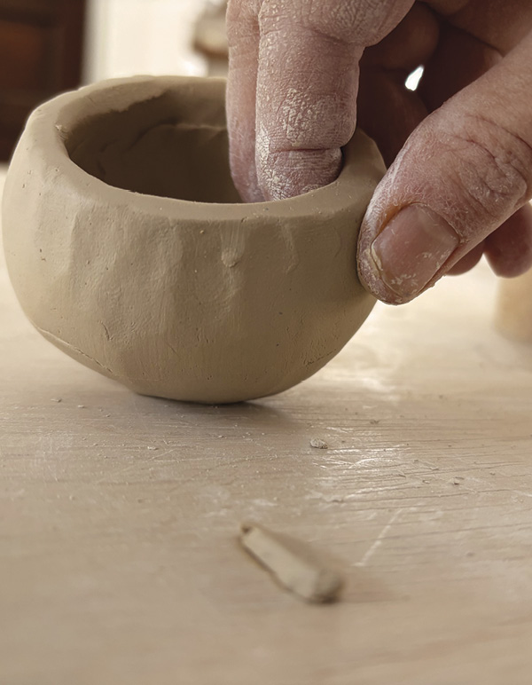 14 Next, make a coil ring and pinch into a small, tapered bottomless bowl.