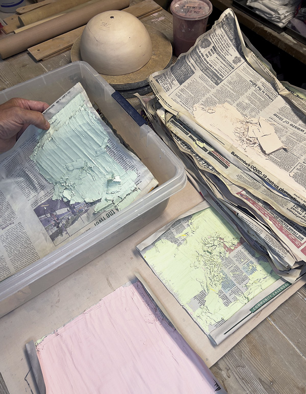 2 Store dried slipped sheets in a bin to keep dry and quickly accessible.