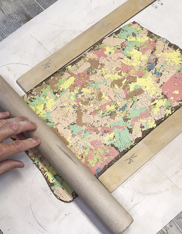 6 Roll and stretch the slab; allow colored slips to break and create new patterns.