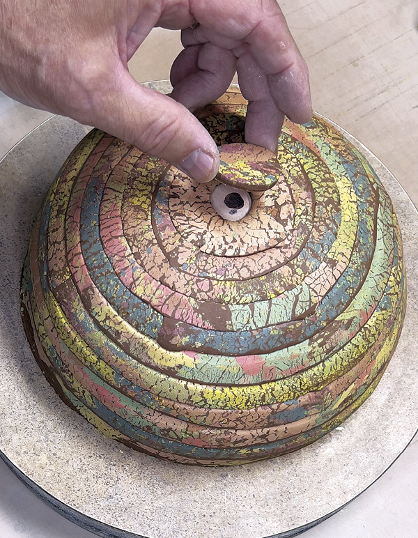 11 Add all the strips. Cut out a circle to close the opening at the mold’s top.