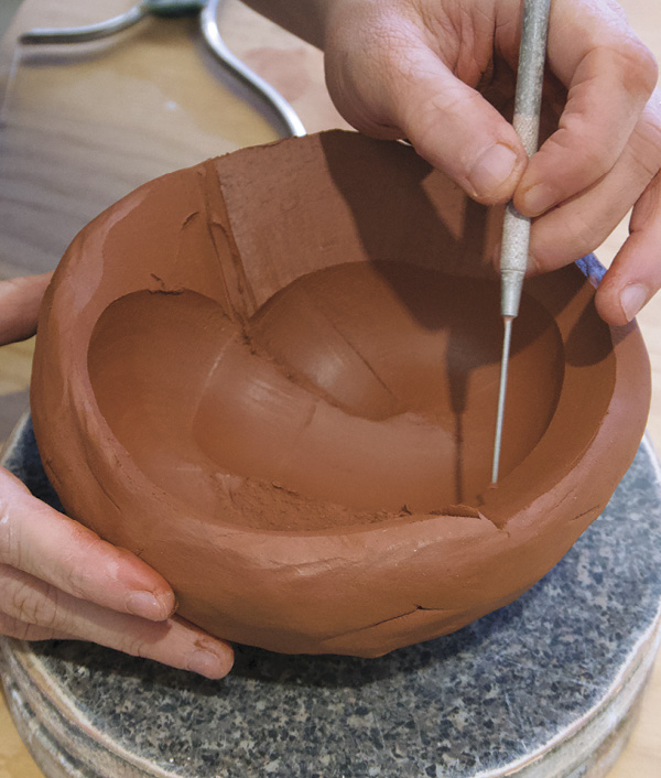 10 Mark the edge of the exterior wall before shaping it with the wire harp.