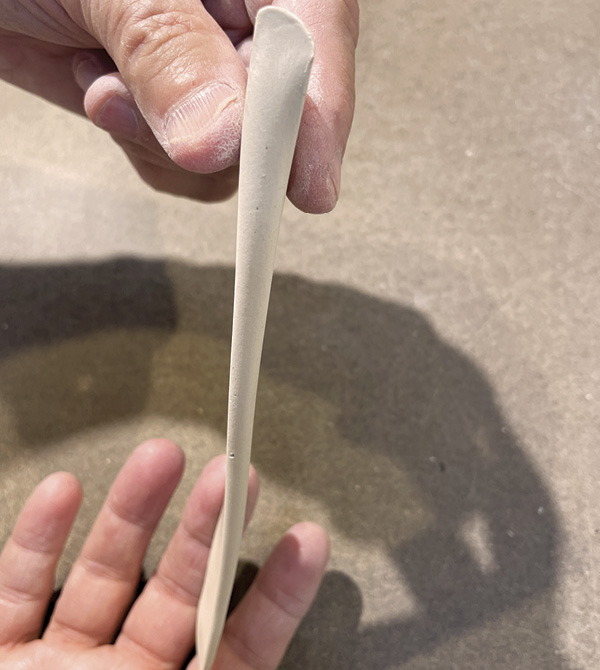 A2 Using a rolling pin, roll over the triangle gradually increasing the pressure.