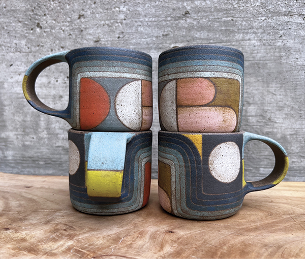 Stack of four mugs by Rory Foster.