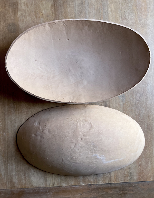 1 Create bisque-fired molds from a form, like a wooden dough bowl.