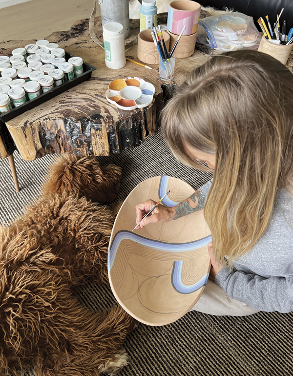 9 Sitting on the floor to hold the platter allows for more precision in making lines.