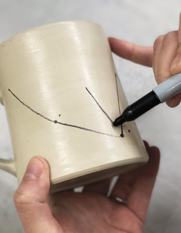 2 Plan your surface design with a permanent marker before carving.