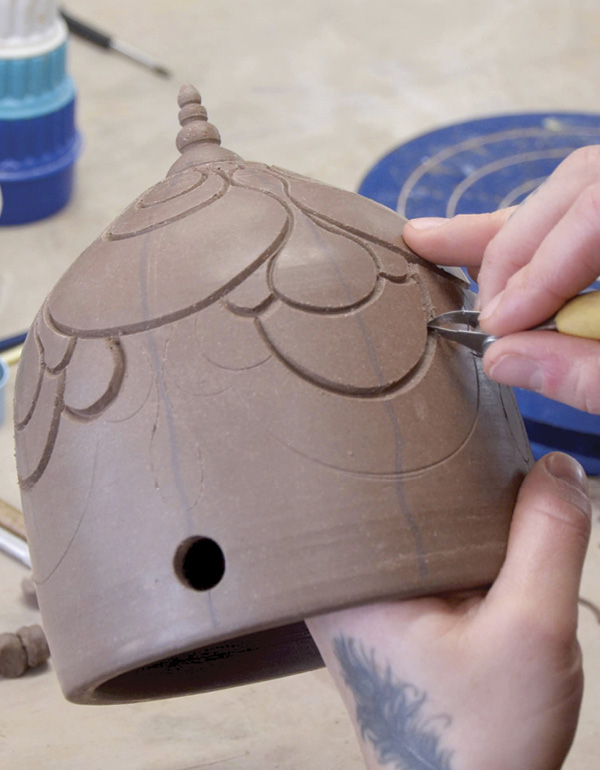 14 Carve out the lines in the design using your favorite carving tool.