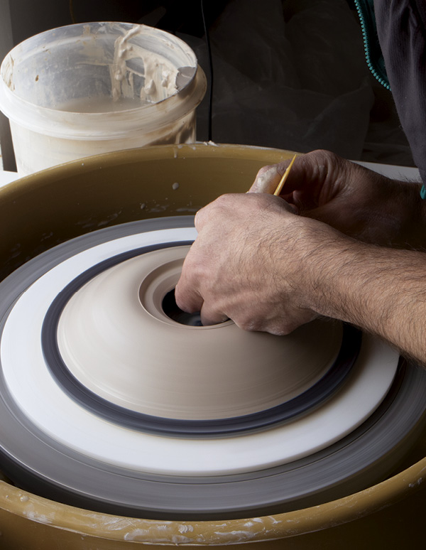 2 Throw the top separately. Use a rib to depress a rim into the gallery.