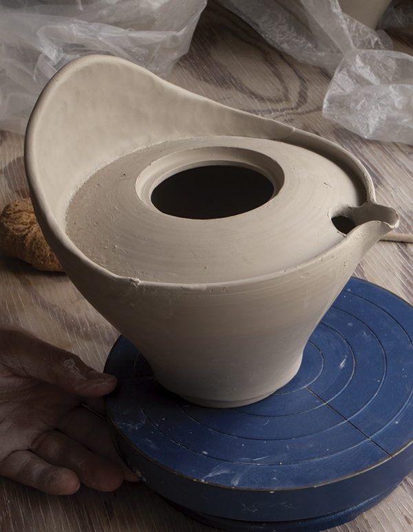 7 Pinch the first tapered coil up into an even wall.