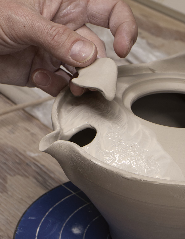 14 Create a spout cover/hood and attach it to the shoulder top.