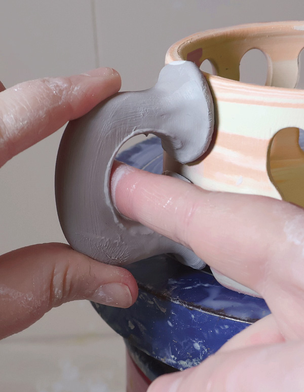 10 Attach the slab cut handle to the exterior form, then refine for comfort.