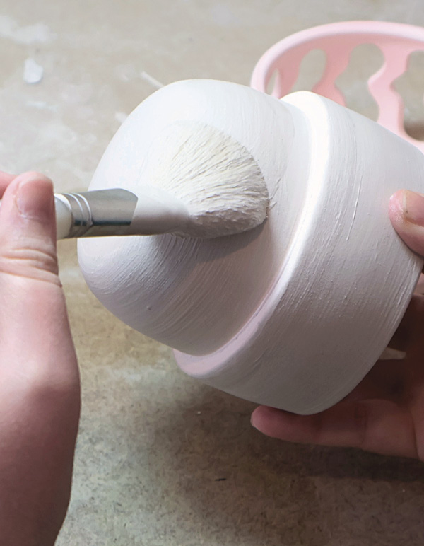 12 Glaze the interior piece, leaving the flange free of glaze.