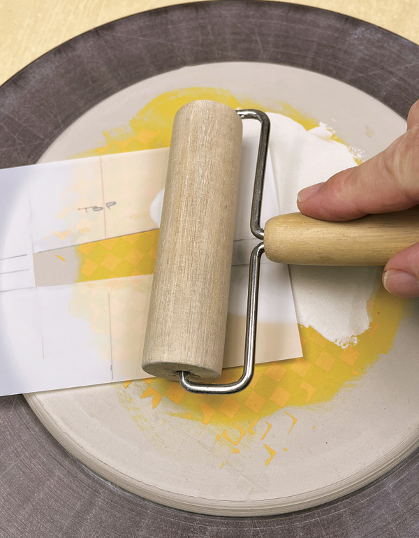 9 To create a rectangular shape, a stencil is cut from a sheet of Mylar.