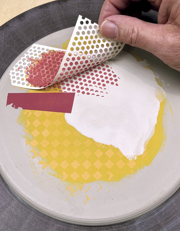 12 Peel up the drywall tape to reveal a pattern of dots.