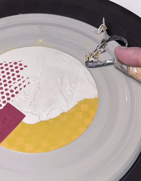 17 Use a trim tool to clear away the unwanted remnants of underglaze.