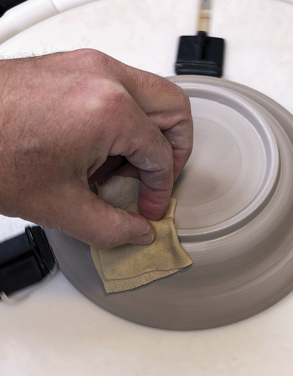 23 Once satisfied with the trimming, smooth the underside with a chamois.