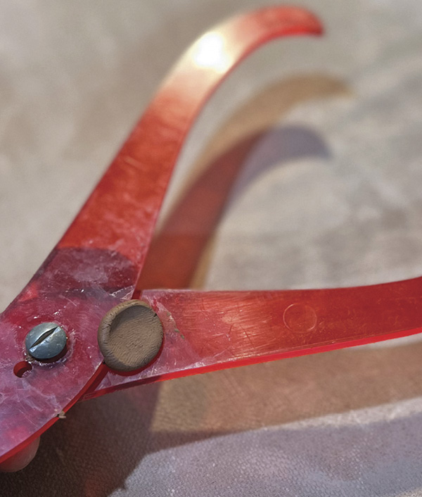 4 After taking a measurement, use a small wad of wet clay to lock your caliper measurement in place.