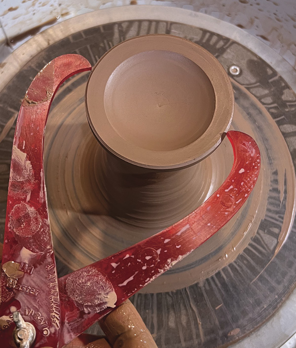 5 Reference the caliper measurement you took earlier when throwing the lid for a perfect fit.