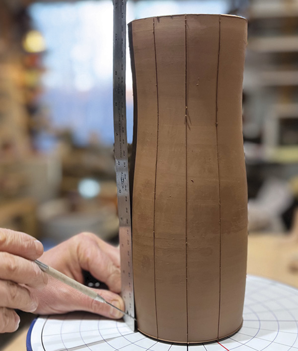 11 Divide the pot into 24 equal parts using a circle divider, straight edge, and needle tool.