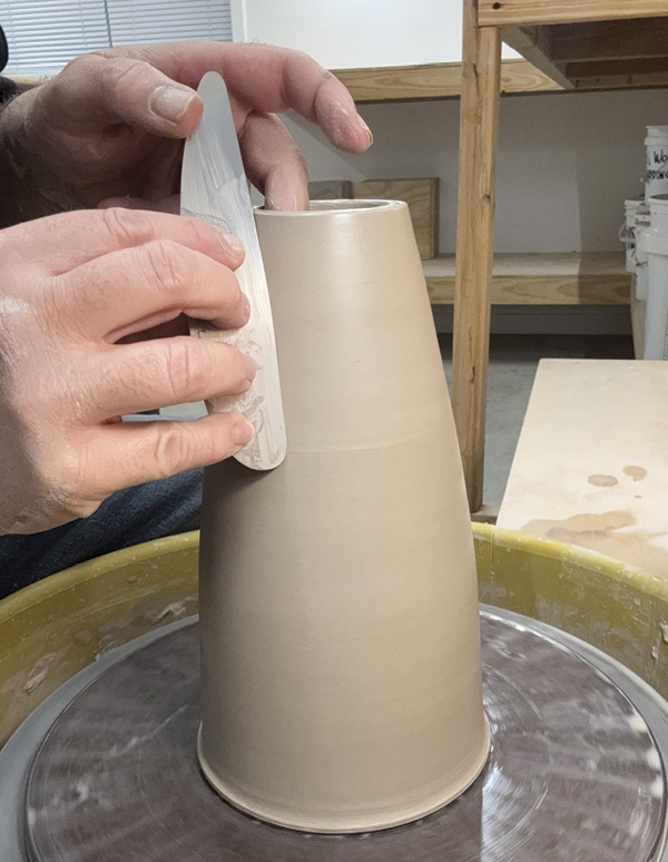 1 Smooth thrown surfaces in preparation for adding fine details later.