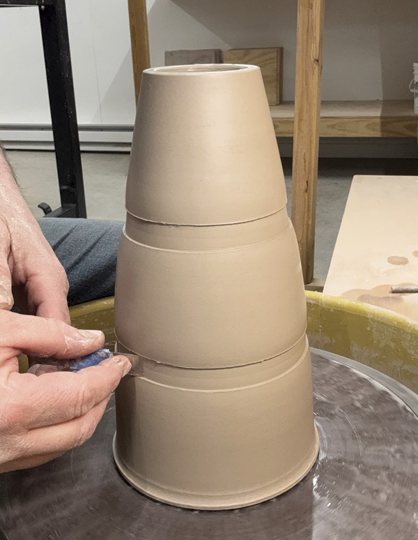 3 Add horizontal bands while the clay is freshly thrown.