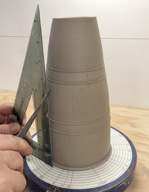 6 Add division marks to the form using a circle divider and right-angle square.