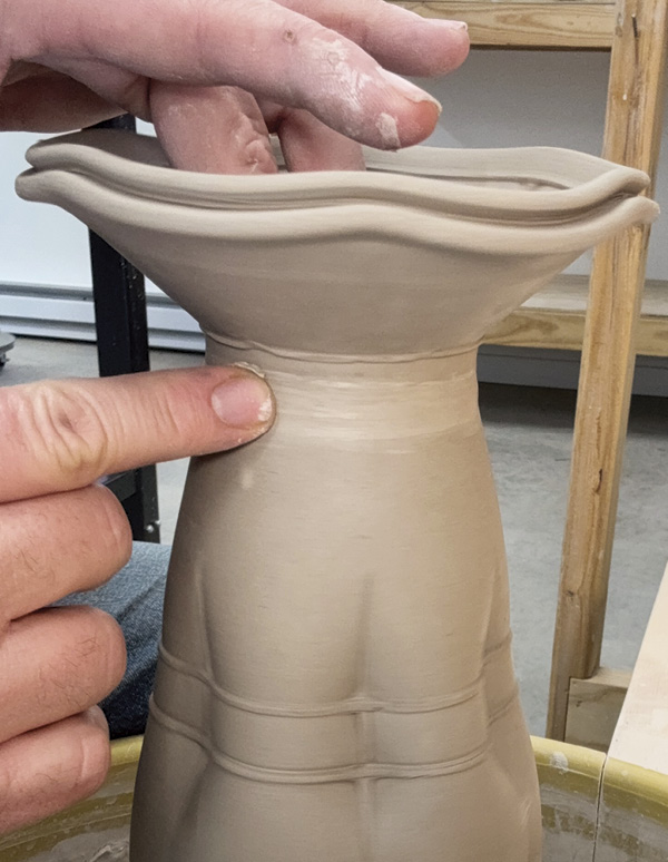 11 Smooth and refine the attached top and bottom sections.