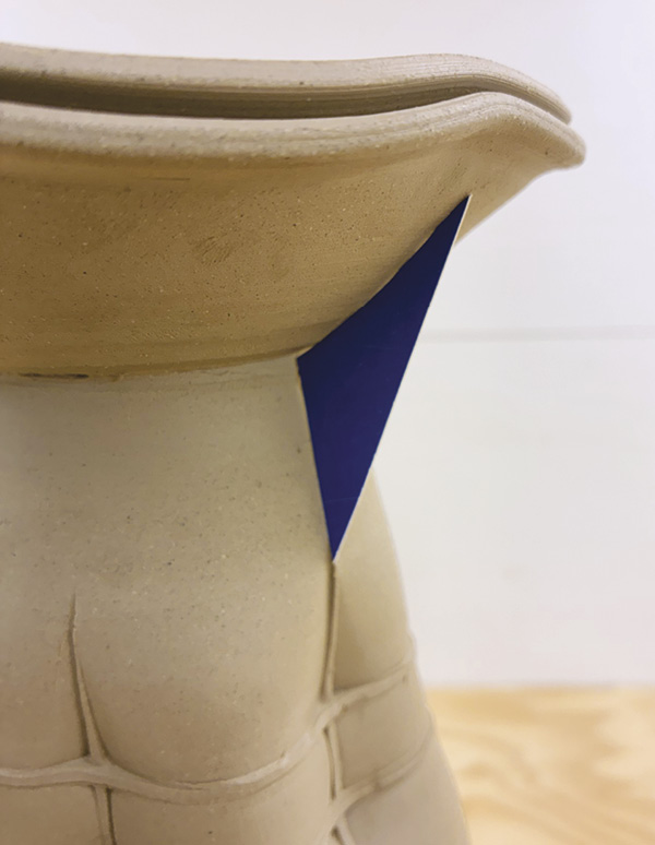 12 Create a custom buttress template for each vase from cardstock.