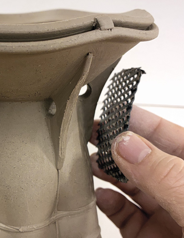 15 Use a Surform to create a concave surface on each buttress.