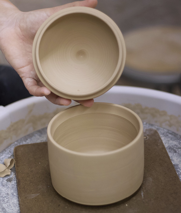 5 Separate the lid from the body with a needle tool. Trim a gallery into the body, and use the body as a chuck.