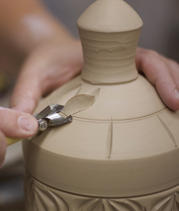 14 Create continuity in your lid by using the same tools and carving motifs as you developed on the rest of the form.