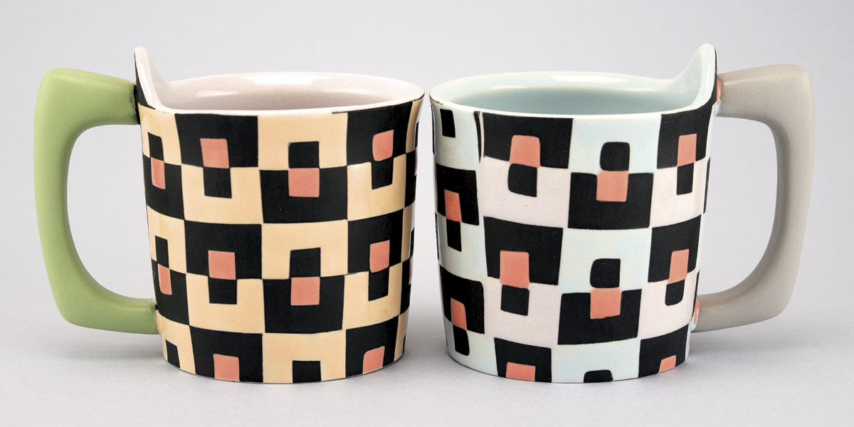 Adrienne Eliades’ Mirror Mirror Mugs, 3.75 in. (9.5 cm) in height, porcelain, underglaze, and glaze, 2024.