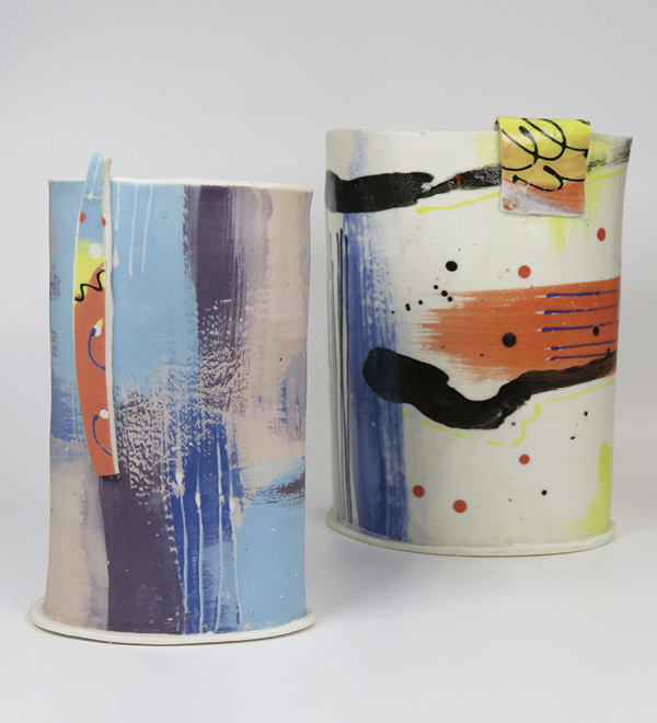 Donna Bloye's finished vessels showing a wide range of dynamic marks that can be made using the monotype process. The mark making is spontaneous, using both brushes and slip trailers, with vivid and uplifting colors that have been further enhanced by two coats of HG Tile Protector.